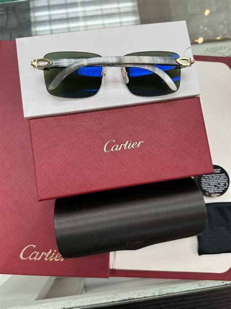 white buffalo horn-frame cartier sunglasses